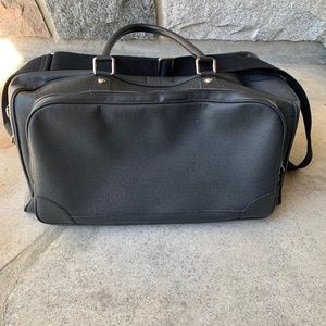 Louis Vuitton Weekend leather bag